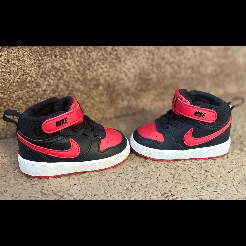 Red and black Nike size 4